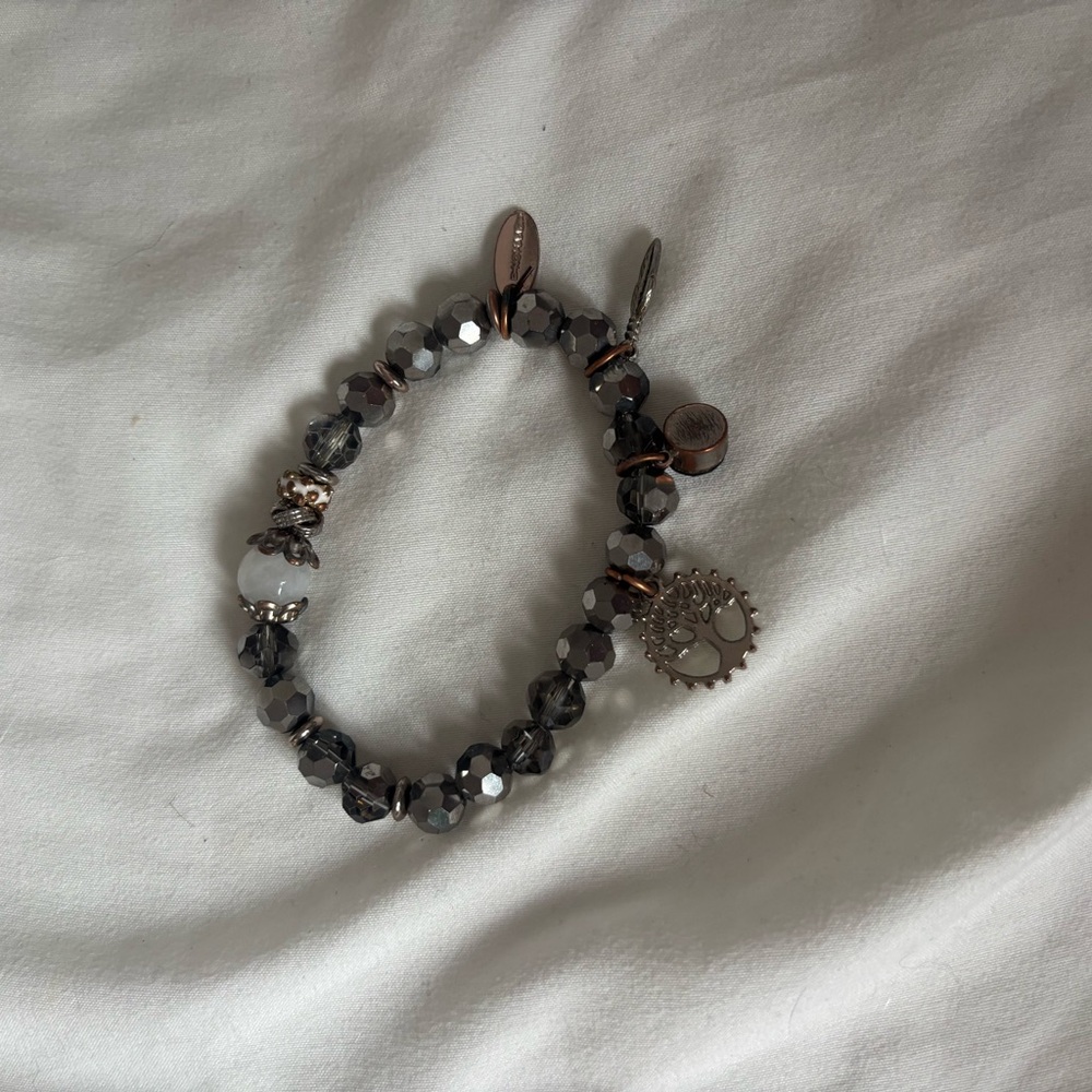 Elegant Beaded Bracelet with Charms